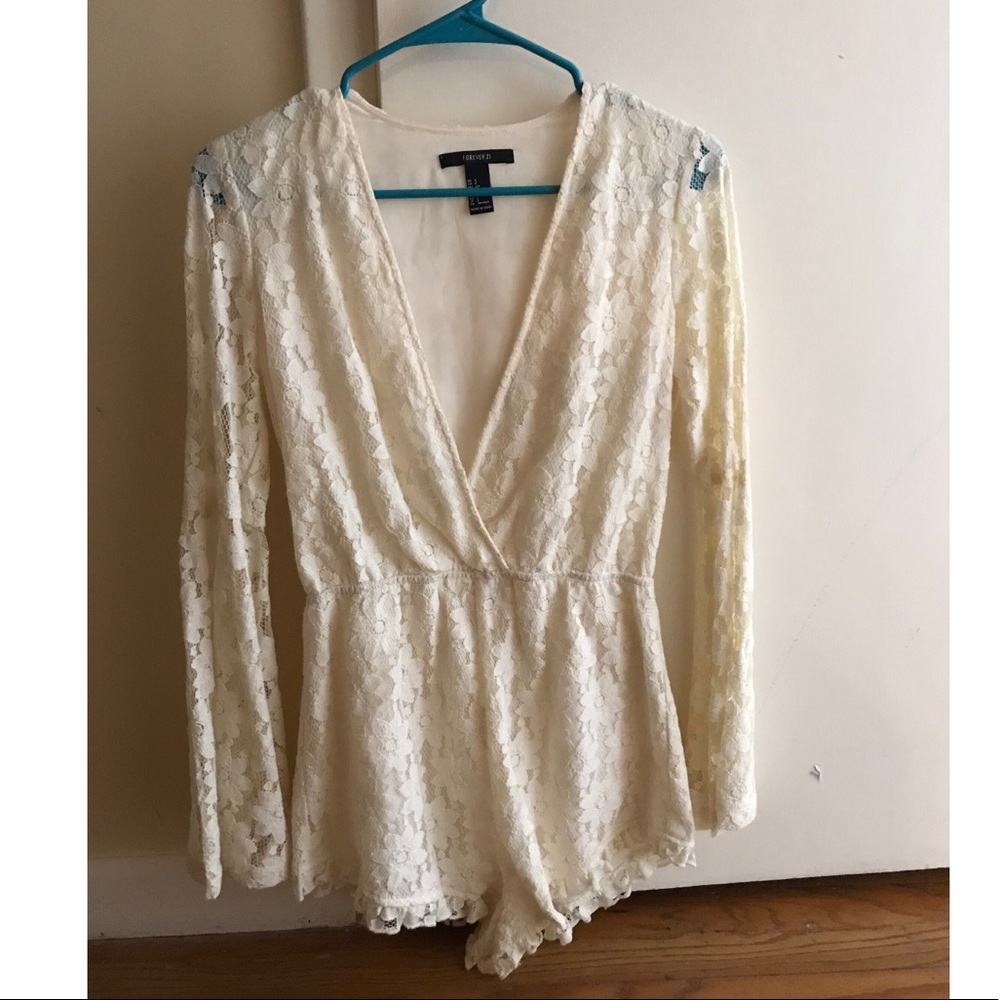 Cute off-white deep V romper from Forever 21